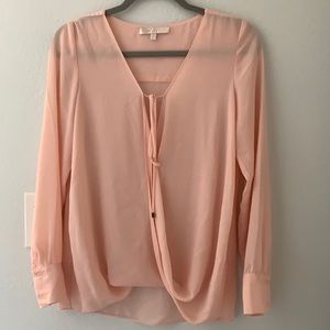 Size XS Shift/front tie long sleeved blouse